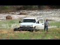 Truck Gets Stuck In River Bed As Water Rises