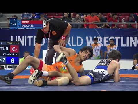 BRONZE FS - 55 kg: A. AMAN (IND) v. M. KARAVUS (TUR)