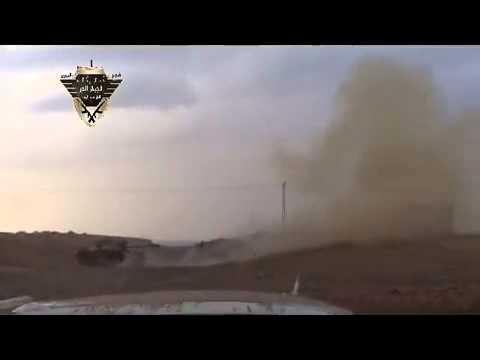 استهداف محطة الاذاعة والتلفزيون بقذيفة دبابة من قبل كتائب الجيش الحر في دير الزور