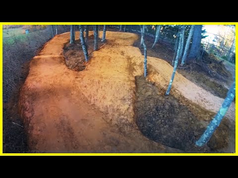 Part of a video titled How to Build a Pump Track | BUILDING TIPS & BEST PRACTICES