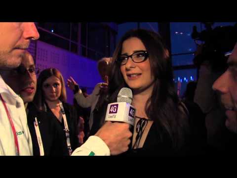 Moran Mazor from Israel gets interviewed by or reporters