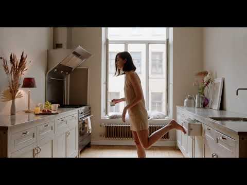 Cooking Breakfast in a see through nightgown