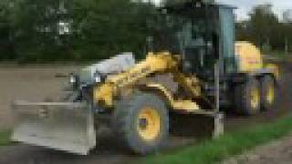 preview picture of video 'New Holland 106.6a Rough Grading Crushed Asphalt'