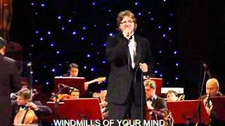 Kadr z teledysku Windmills Of Your Mind (Polish version) tekst piosenki Robert Kowalski