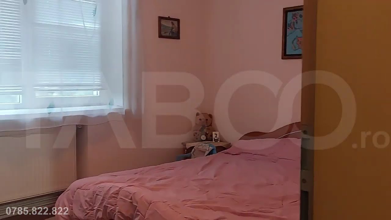 Apartament 2 camere decomandate 57 mp balcon bloc cu acoperis Cisnadie - Video