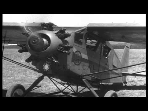 A pilot in cockpit  of Potez 25 biplane in Ethiopia. Scenes of  Breda Ba.15 aircr...HD Stock Footage