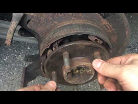 2003 Ford Crown Victoria Sport replace outer axle bearings with repair bearing. differential opening