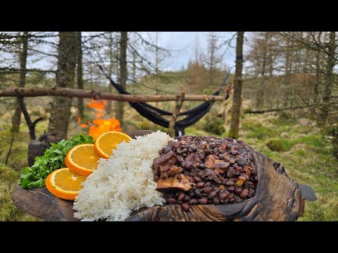 Brazilian Feijoada cooked outdoors inside the log fire 🔥
