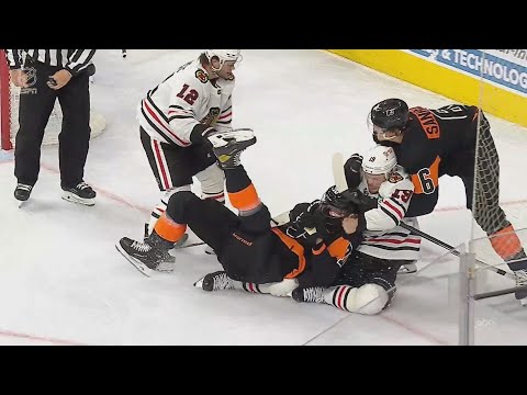 Jonathan Toews Comes To Alex DeBrincat's Rescue In Scrum