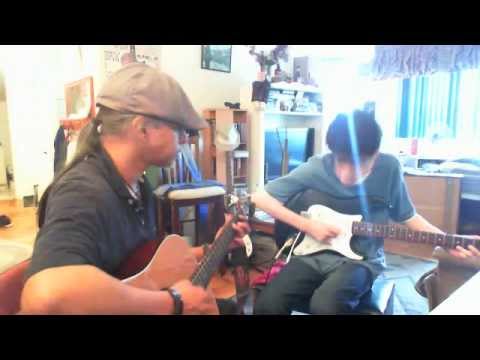 Robert and I trying to play something like the blues on his new guitar !! lol lol