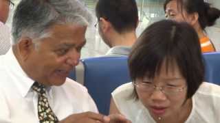 preview picture of video 'Aruna & Hari Sharma at Shijiazhuang railway Station for Handan, Hebei, China Sep 10, 2013'