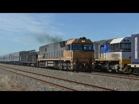 MA8 "The Overland" Passenger Train Crosses QRNational  Freight Train (27/10/2009) - PoathTV