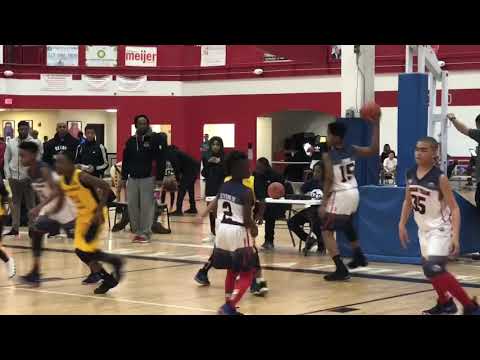 In the 12U @MiInvitational, REACH Dream Team - Cheeks beat The Family showing amazing ball movement