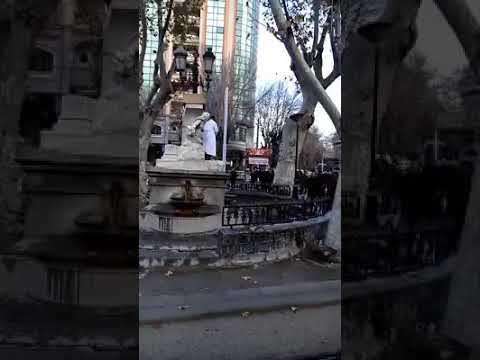 A muslim migrant destroying a statue in Italy , b'cos part of the body is showing.