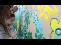 Children From SmartKids Learning Center Paint Mural