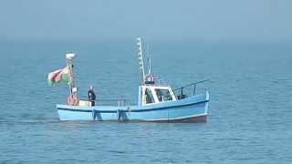 Welsh fishing boat off Prestatyn Promenade Denbighshire Wales UK