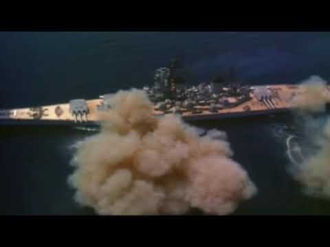 Iowa class battleship firing 16 inch guns
