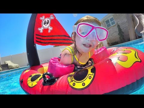 PIRATE SHIP POOL PARTY!! The family plays with inflatable toys and Adley is a mermaid! Video