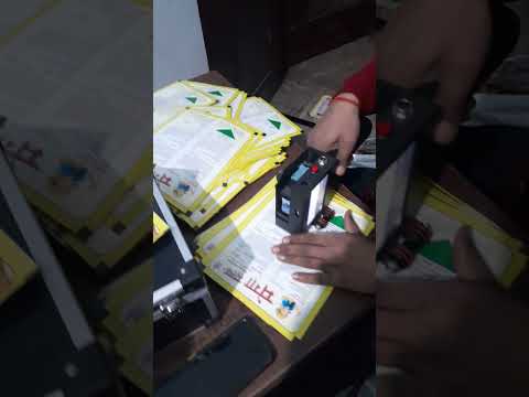 Handheld inkjet printer