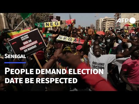 Thousands of Senegalese march with elections back on | AFP