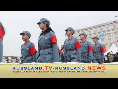 Kinder aus Russland und China nehmen an der Siegesparade in Wladiwostok teil