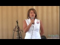 Kellie Jackson talked to the crowd at the 106th Annual Lone Oak Picnic