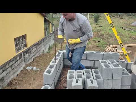 Como levantar canto de parede de bloco estrutural de concreto vazado