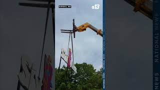 Crews change Six Flags sign to Mid America Adventure