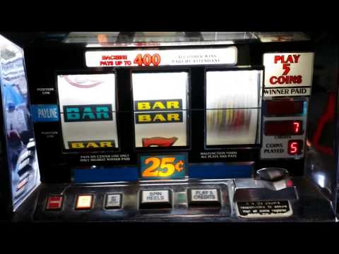 25 CENT 5 COIN IGT HAYWIRE SLOT MACHINE