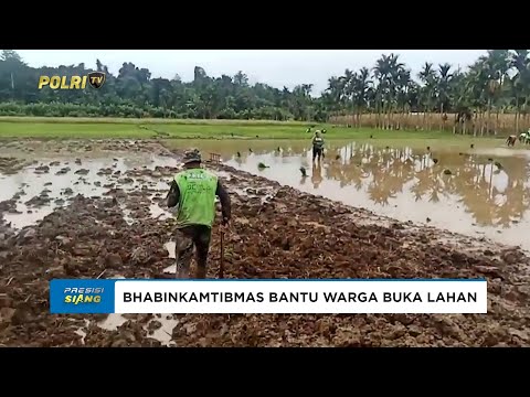 BHABINKAMTIBMAS KAMPUNG YEETI BANTU WARGA BUKA LAHAN PERTANIAN