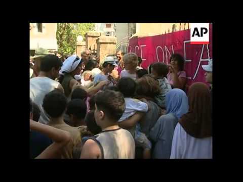 US Undersecretary Welch, US peace group handing out icecreams to kids