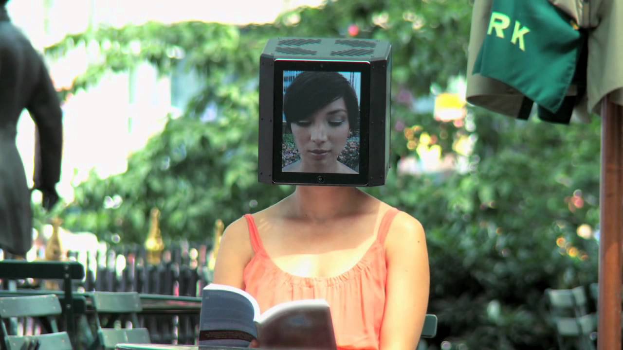 Why Is iPad-Head Girl Stalking Around New York City?