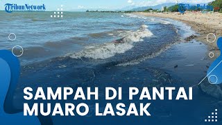 Sampah Muncul Lagi di Pantai Muaro Lasak Padang, Air Laut di Bibir Pantai Berwarna Hitam