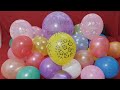 FUN BIG HAPPY BIRTHDAY BALLOON AND LOT S OF PRINTED COLOURFUL BALLOONS POPPING L SATISFYING VIDEO