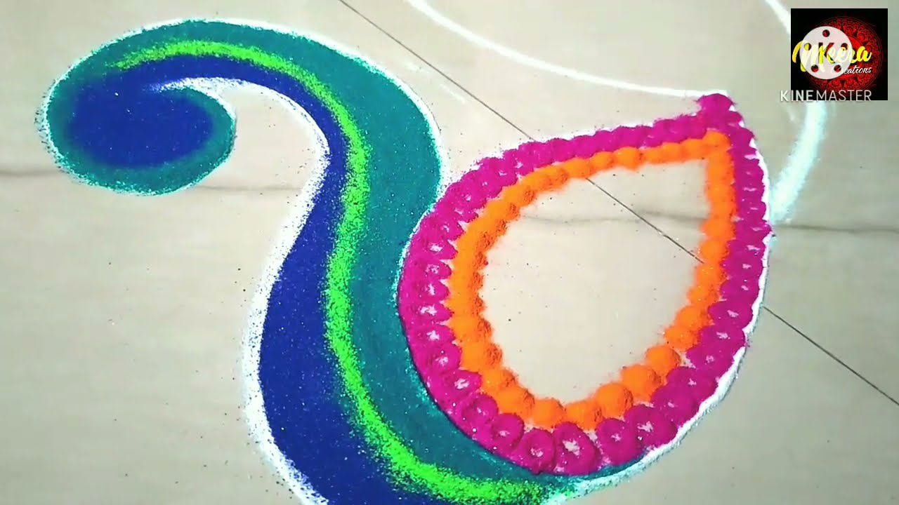 beautiful peacock rangoli design by meeras creation