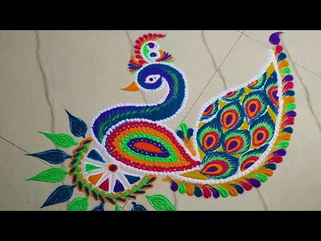 Beautiful peacock rangoli design by meeras creation