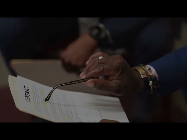 African descent men discussing in an office | Corporate & Commercial Law