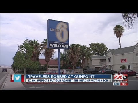 Two Arkansas men robbed inside their Motel 6 room Thursday night