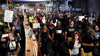 Calmer but defiant mood in Charlotte protests over police shooting of black man