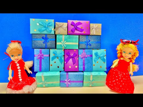 Elsa and Anna toddlers open their Christmas presents