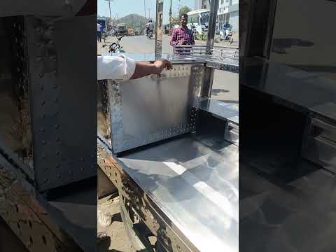 White stainless steel food thela