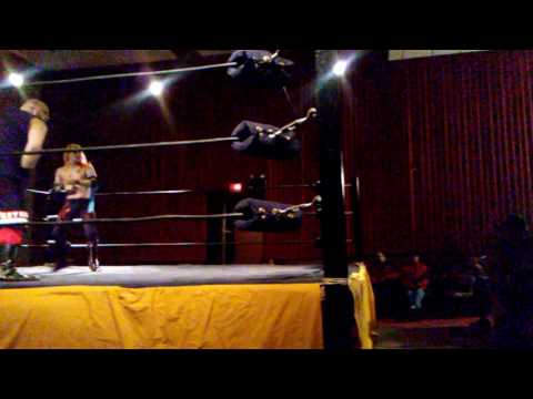 Shawn Phoenix dives out onto the Cogar Brothers at RYSE!