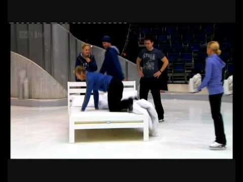 Christopher Dean bouncing on a bed