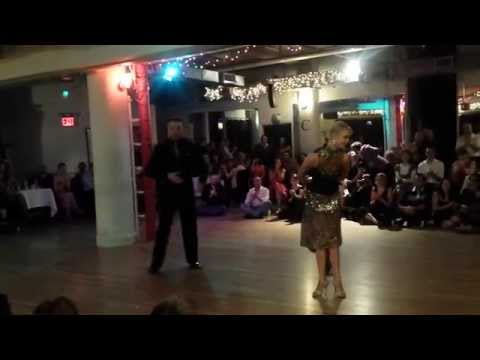  Michael Nadtochi  and  Eleonora Kalganova  are  dancing  to  the  milonga  "  Reliquias Porteñas  "  by  Francisco Canaro