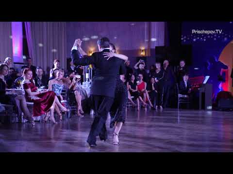  Sergey Kurkatov  and  Dana Zampieri  are  dancing  to  the  tango  "  Amarroto  "  by  Juan D'Arienzo  at  La Boca Tango Festival  in  2021