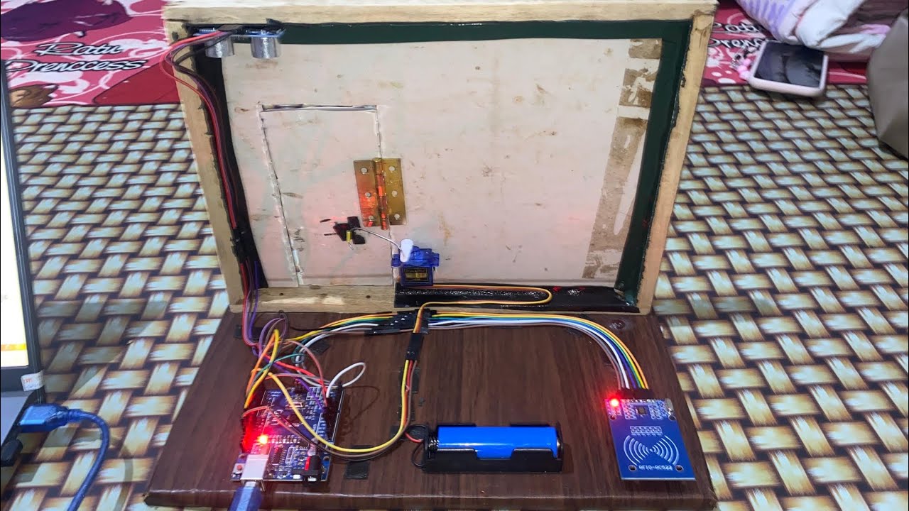 PROJEK SISTEM KUNCI PINTU OTOMATIS VIA KARTU RFID