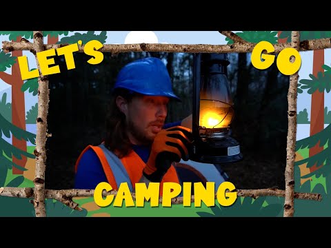 Camper in a blue helmet and orange safety vest holds a lit lantern in a dark forest, framed by a decorative 'Let's Go Camping' border.