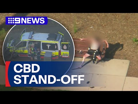 Man hospitalised after Brisbane City stand-off | 9 News Australia