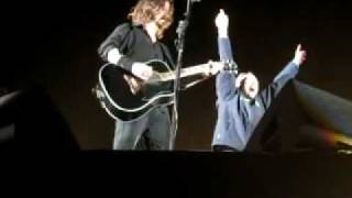 Dave Grohl Brings Fence Jumping Fan On Stage With Him