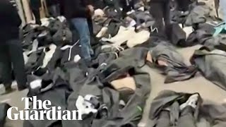 Bodies line the streets outside morgue in Tehran as protests continue